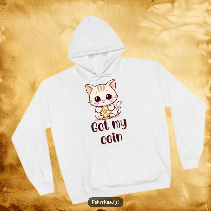 Funny hoodie featuring a smiling cat with neutral eyes, expertly balancing a coin, offering comfort and understated humor.